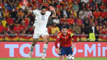 SANTA CRUZ DE TENERIFE, SPAIN - NOVEMBER 18: Alvaro Morata of Spain is challenged by Ricardo Rodriguez of Switzerland in the penalty box leading to a penalty being awarded during the UEFA Nations League 2024/25 League A Group A4 match between Spain and Switzerland at El Heliodoro Rodriguez Lopez stadium on November 18, 2024 in Santa Cruz de Tenerife, Spain. (Photo by David Ramos/Getty Images)