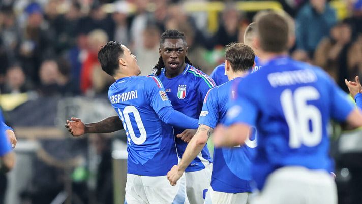DORTMUND, GERMANY - MARCH 23: Moise Kean of Italy celebrates scoring his team's second goal with teammate Giacomo Raspadori during the UEFA Nations League Quarterfinal Leg Two match between Germany and Italy at Football Stadium Dortmund on March 23, 2025 in Dortmund, Germany. (Photo by Christof Koepsel/Getty Images for DFB) Moise Kean