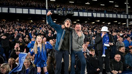 LIVERPOOL, ENGLAND - APRIL 24: Fans of Everton celebrate after the team's victory in the Premier League match between Everton FC and Liverpool FC at Goodison Park on April 24, 2024 in Liverpool, England. (Photo by Michael Regan/Getty Images)