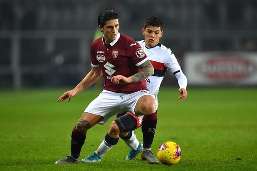 TURIN, ITALY - JANUARY 09: Kevin Bonifazi (L) of Torino FC is challenged by Kevin Agudello of Genoa CFC during the Coppa Italia match between Torino FC and Genoa CFC at Stadio Olimpico Grande Torino on January 9, 2020 in Turin, Italy. (Photo by Valerio Pennicino/Getty Images)