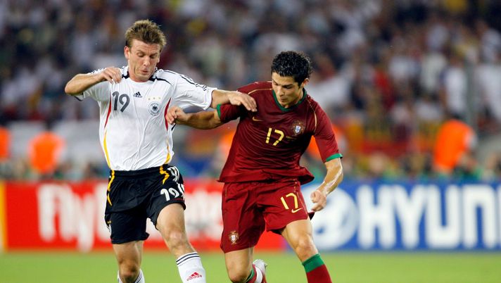 STUTTGART, GERMANY - JULY 08: (L-R) Bernd Schneider of Germany holds off the challenge of Cristiano Ronaldo of Portugal during the FIFA World Cup Germany 2006 Third Place Play-off match between Germany and Portugal played at the Gottlieb-Daimler Stadium on July 8, 2006 in Stuttgart, Germany. (Photo by Stuart Franklin/Bongarts/Getty Images) Germania Portogallo