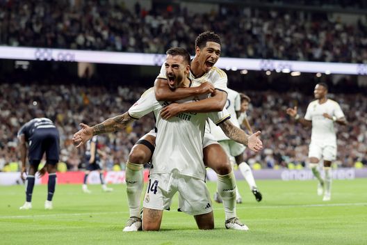 MADRID, SPAIN - SEPTEMBER 17: Joselu of Real Madrid celebrates with team mate Jude Bellingham after scoring their sides second goal during the LaLiga EA Sports match between Real Madrid CF and Real Sociedad at Estadio Santiago Bernabeu on September 17, 2023 in Madrid, Spain. (Photo by Gonzalo Arroyo Moreno/Getty Images) Champions League