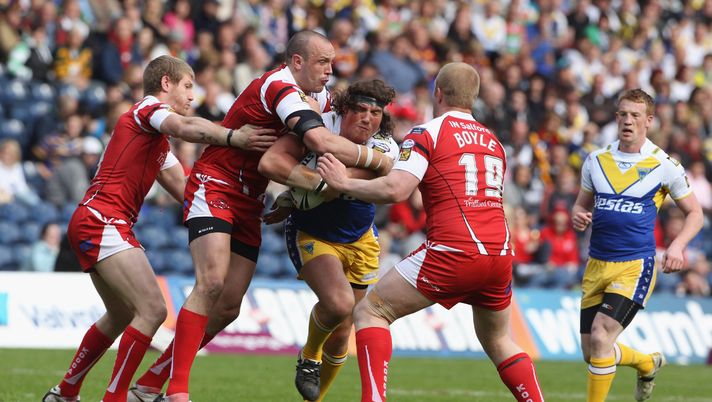 EDINBURGH, SCOTLAND - MAY 01: Ben Harrison of Warrington Wolves gets tackled by Ian Sibbit and Ryan Boyle of Salford City Reds during the Engage Rugby Super League Magic Weekend match between Salford City Reds and Warrington Wolves at Murrayfield on May 1, 2010 in Edinburgh, Scotland. (Photo by Phil Cole/Getty Images) Warrington super rugby