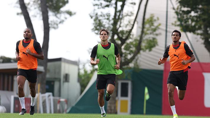 CAIRATE, ITALY - SEPTEMBER 21: Samuele Ricci and Christopher Nkunku of AC Milan in action during AC Milan training session at Milanello on September 21, 2025 in Cairate, Italy. (Photo by Claudio Villa/AC Milan via Getty Images) Milan