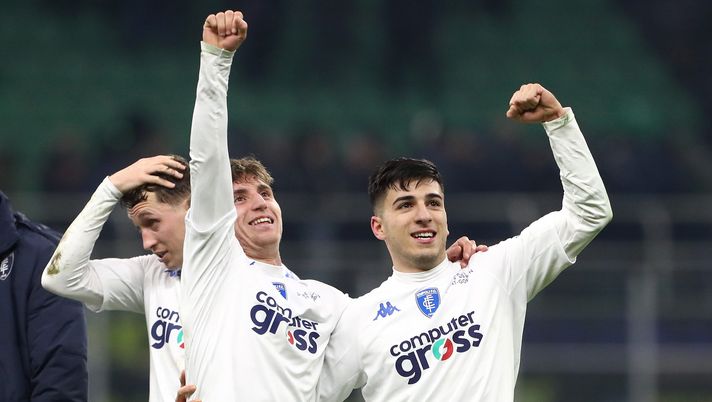 MILAN, ITALY - JANUARY 23: Tommaso Baldanzi and Fabiano Parisi of Empoli FC celebrate with the fans after the team's victory during the Serie A match between FC Internazionale and Empoli FC at Stadio Giuseppe Meazza on January 23, 2023 in Milan, Italy. (Photo by Marco Luzzani/Getty Images) Parisi