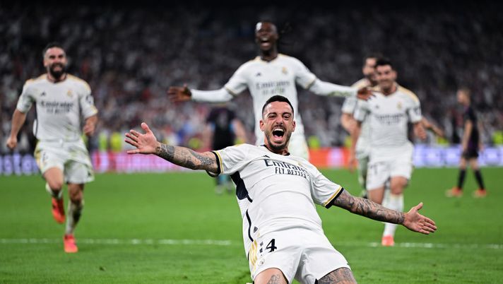 MADRID, SPAIN - MAY 08: Joselu of Real Madrid celebrates scoring his team's second goal during the UEFA Champions League semi-final second leg match between Real Madrid and FC Bayern München at Estadio Santiago Bernabeu on May 08, 2024 in Madrid, Spain. (Photo by David Ramos/Getty Images) Real Madrid, il Bernabeu più di una casa: tutte le rimonte dei blancos tra le loro mura - immagine 1
