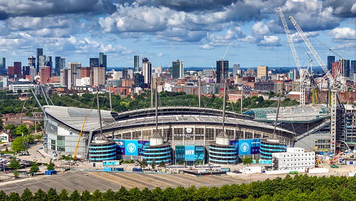 MANCHESTER, ENGLAND - JULY 03: An aerial view of the Etihad Stadium, the home of Manchester City Football Club, and the Ancoats and Islington neighbourhoods in the background where property company Manchester Life have assets on July 03, 2025 in Manchester, England. Sheikh Mansour bin Zayed Al Nahyan (Sheikh Mansour) is an Emirati politician, businessman and member of the Abu Dhabi royal family who has made considerable investments in Manchester, beginning with his purchase of Manchester City FC in 2008. In 2014, Sheikh Mansour's Abu Dhabi United Group (ADUG) went into partnership with Manchester City Council to create Manchester Life, in which the council leases him publicly-owned land for development with capital provided by ADUG. Manchester Life has built 1,500 homes across seven new developments and two historic mill conversions in areas near Manchester City FC's Etihad Stadium. Sheikh Mansour, who is the brother of the crown prince of Abu Dhabi, currently serves as vice president and deputy prime minister of the United Arab Emirates. (Photo by Christopher Furlong/Getty Images) Reijnders