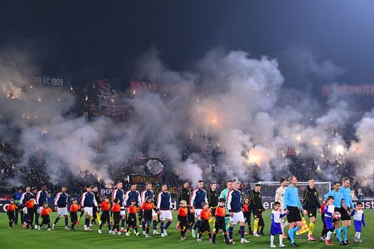 BOLOGNA, ITALY - JANUARY 21: A general view of the inside of the stadium as players of Bologna and Borussia Dortmund walk out onto the pitch, as fans of Bologna use smoke flares, prior to the UEFA Champions League 2024/25 League Phase MD7 match between Bologna FC 1909 and Borussia Dortmund at Stadio Renato Dall'Ara on January 21, 2025 in Bologna, Italy. (Photo by Alessandro Sabattini/Getty Images)