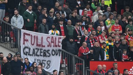 MANCHESTER, ENGLAND - APRIL 30: Fans display a banner against the Glazer family's ownership of the club during the Premier League match between Manchester United and Aston Villa at Old Trafford on April 30, 2023 in Manchester, England. (Photo by Gareth Copley/Getty Images)