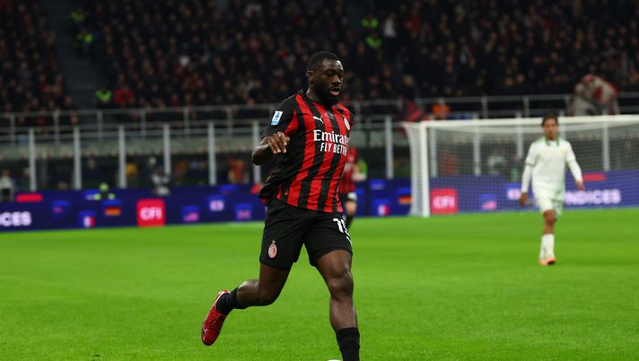 MILAN, ITALY - NOVEMBER 02: Youssouf Fofana of AC Milan runs with the ball during the Serie A match between AC Milan and AS Roma at Giuseppe Meazza Stadium on November 02, 2025 in Milan, Italy. (Photo by Giuseppe Cottini/AC Milan via Getty Images) fofana-milan-roma-serie-a