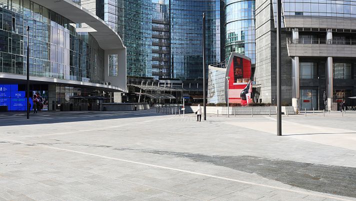 MILAN, ITALY - FEBRUARY 26: Roads and squares in the CityLife neighborhood in the city center, usually full of people, are seen empty on February 26, 2020 in Milan, Italy.
The country is struggling to understand how it went from six coronavirus cases to 374 cases and 12 dead since last Friday, becoming Europe's worst-affected country. Many communities across the Lombardy and Veneto regions have seen the suspension of public events and church services, and the closure of grade schools, universities and museums. Twelve towns have been locked down entirely, with road blocks preventing the exit and entrance of people. The government has also imposed quarantines for those who have had close contact with confirmed cases of the illness. (Photo by Marco Di Lauro/Getty Images) Milano Football Week