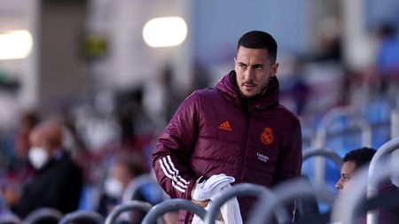 MADRID, SPAIN - APRIL 27: Eden Hazard of Real Madrid looks on from the bench during the UEFA Champions League Semi Final First Leg match between Real Madrid and Chelsea FC at Estadio Alfredo Di Stefano on April 27, 2021 in Madrid, Spain. Sporting stadiums around Spain remain under strict restrictions due to the Coronavirus Pandemic as Government social distancing laws prohibit fans inside venues resulting in games being played behind closed doors. (Photo by Angel Martinez/Getty Images)