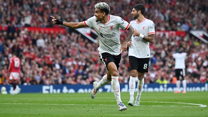 MANCHESTER, ENGLAND - SEPTEMBER 01: Luis Diaz of Liverpool celebrates scoring his team's second goal during the Premier League match between Manchester United FC and Liverpool FC at Old Trafford on September 01, 2024 in Manchester, England. (Photo by Shaun Botterill/Getty Images) Manchester United FC v Liverpool FC - Premier League