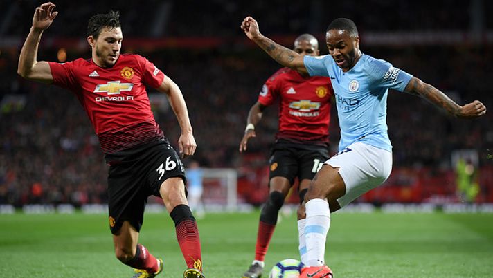 MANCHESTER, ENGLAND - APRIL 24: Raheem Sterling of Manchester City crosses the ball under pressure from Matteo Darmian of Manchester United during the Premier League match between Manchester United and Manchester City at Old Trafford on April 24, 2019 in Manchester, United Kingdom. (Photo by Shaun Botterill/Getty Images) Il derby di Darmian: io, ex Manchester United, in finale proprio contro il City… - immagine 1