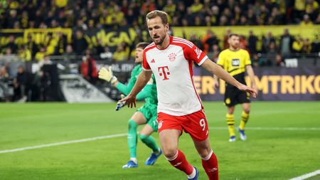 DORTMUND, GERMANY - NOVEMBER 04: Harry Kane of Bayern Munich celebrates after scoring the team's second goal during the Bundesliga match between Borussia Dortmund and FC Bayern München at Signal Iduna Park on November 04, 2023 in Dortmund, Germany. (Photo by Lars Baron/Getty Images)