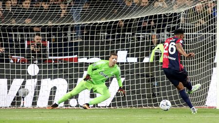 CAGLIARI, ITALY - APRIL 19: Yerry Mina of Cagliari scores his goal 2-0 during the Serie A TIM match between Cagliari and Juventus at Sardegna Arena on April 19, 2024 in Cagliari, Italy. (Photo by Enrico Locci/Getty Images)