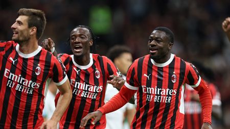 MILAN, ITALY - SEPTEMBER 14: Matteo Gabbia of AC Milan celebrates with team-mates after scoring the goal during the Serie A match between Milan and Venezia at Stadio Giuseppe Meazza on September 14, 2024 in Milan, Italy. (Photo by Claudio Villa/AC Milan via Getty Images)