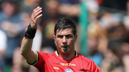 VENICE, ITALY - APRIL 27: Referee Gianluca Manganiello during the Serie A match between Venezia and AC Milan at Stadio Pier Luigi Penzo on April 27, 2025 in Venice, Italy. (Photo by Timothy Rogers/Getty Images)
