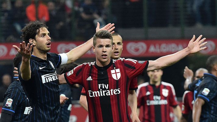 MILAN, ITALY - APRIL 19: Andrea Ranocchia of Internazionale Milano and Marco Van Ginkel of Milan in action during the Serie A match between FC Internazionale Milano and AC Milan at Stadio Giuseppe Meazza on April 19, 2015 in Milan, Italy. (Photo by Giuseppe Bellini/Getty Images) Ex Milan, van Ginkel: “Muntari stava per spezzarmi una caviglia in allenamento” - immagine 1