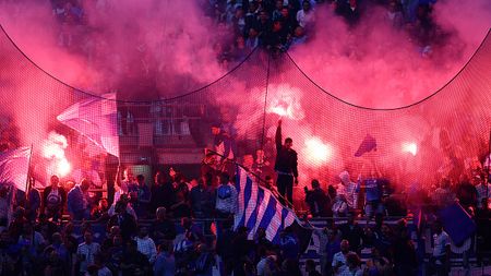 MARSEILLE, FRANCE - NOVEMBER 01: Marseille fans show their support with flares and flags during the UEFA Champions League group D match between Olympique Marseille and Tottenham Hotspur at Orange Velodrome on November 01, 2022 in Marseille, France. (Photo by Clive Rose/Getty Images)