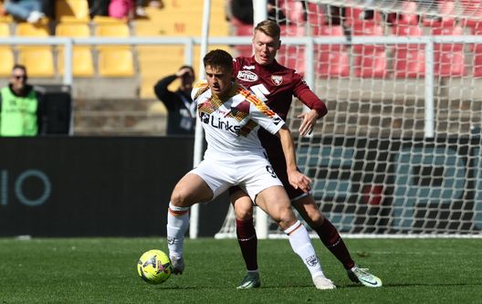 LECCE, ITALY - MARCH 12: Lorenzo Colombo of Lecce competes for the ball with Perr Schuurs of Torino during the Serie A match between US Lecce and Torino FC at Stadio Via del Mare on March 12, 2023 in Lecce, Italy. (Photo by Maurizio Lagana/Getty Images)