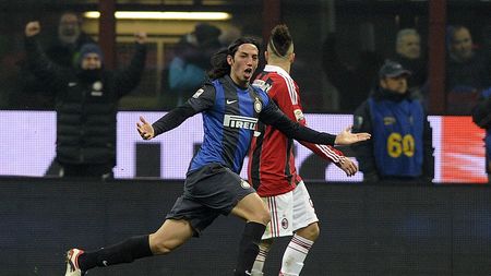 MILAN, ITALY - FEBRUARY 24: Ezequiel Schelotto of FC Inter Milan celebrates scoring the first goal during the Serie A match FC Internazionale Milano and AC Milan at San Siro Stadium on February 24, 2013 in Milan, Italy. (Photo by Claudio Villa/Getty Images)