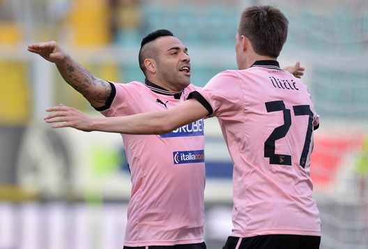 PALERMO, ITALY - MARCH 30: Fabrizio Miccoli (L) of Palermo celebrates with Josip Ilicic after scoring his team's second goal during the Serie A match between US Citta di Palermo and AS Roma at Stadio Renzo Barbera on March 30, 2013 in Palermo, Italy. (Photo by Tullio M. Puglia/Getty Images) Palermo