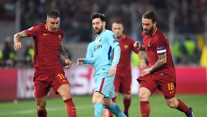 ROME, ITALY - APRIL 10: Aleksandar Kolarov of AS Roma is challenged by Lionel Messi of Barcelona UEFA Champions League Quarter Final Second Leg match between AS Roma and FC Barcelona at Stadio Olimpico on April 10, 2018 in Rome, Italy. (Photo by Michael Regan/Getty Images) De Rossi e il legame speciale con Kolarov: “Lo considero un fratello” - immagine 1