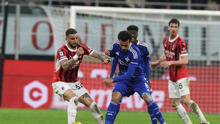 MILAN, ITALY - MARCH 15: Kyle Walker and Dele Alli of Como compete for the ball during the Serie match between Milan and Como at Stadio Giuseppe Meazza on March 15, 2025 in Milan, Italy. (Photo by Claudio Villa/AC Milan via Getty Images)  Walker Dele Alli