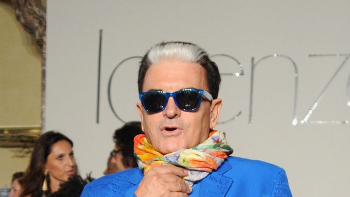 A model walks the runway at the Lorenzo Riva Spring/Summer 2013 fashion show as part of Milan Womenswear Fashion Week on September 24, 2012 in Milan, Italy.  Malgioglio: “La mia Rosa più hot di Kim Basinger. Dopo Tale e Quale farò una parte in Beatiful”- immagine 1