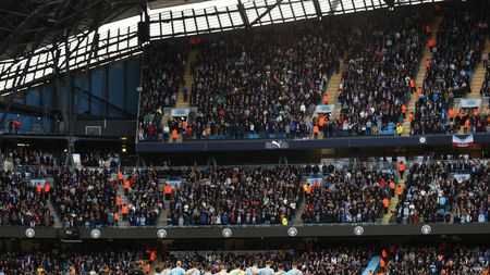 MANCHESTER, ENGLAND - OCTOBER 21: A general view of the inside of the stadium as Players, fans and match officials observe a minutes silence in remembrance of the victims of the recent attacks in Israel and Gaza prior to the Premier League match between Manchester City and Brighton & Hove Albion at Etihad Stadium on October 21, 2023 in Manchester, England. (Photo by Charlotte Tattersall/Getty Images)