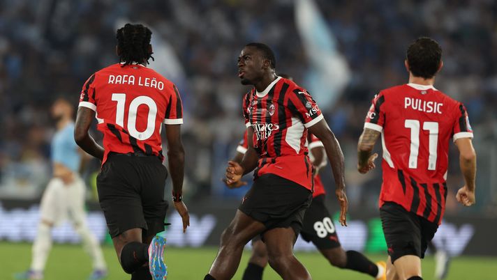 ROME, ITALY - AUGUST 31: Rafael Lea of AC Milan celebrates with Yunus Musah after scoring the goal during the Serie A match between Lazio and Milan at Stadio Olimpico on August 31, 2024 in Rome, Italy. (Photo by Claudio Villa/AC Milan via Getty Images) Lazio milan