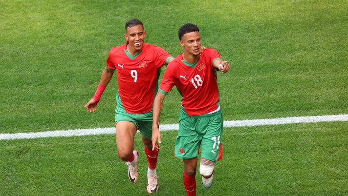 NICE, FRANCE - JULY 30: Amir Richardson #18 of Team Morocco celebrates scoring his team's first goal with teammate Soufiane Rahimi during the Men's group B match between Morocco and Iraq during the Olympic Games Paris 2024 at Stade de Nice on July 30, 2024 in Nice, France. (Photo by Marc Atkins/Getty Images) Nome nuovo dalla Francia: Fiorentina e altri tre club su Richardson del Reims - immagine 1