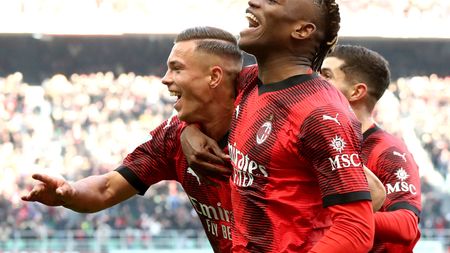MILAN, ITALY - DECEMBER 17: Jan-Carlo Simic of AC Milan celebrates with Rafael Leao of AC Milan after scoring their team's second goal during the Serie A TIM match between AC Milan and AC Monza at Stadio Giuseppe Meazza on December 17, 2023 in Milan, Italy. (Photo by Marco Luzzani/Getty Images)