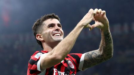 MILAN, ITALY - SEPTEMBER 27: Christian Pulisic of AC Milan celebrates scoring his team's third goal during the Serie A match between AC Milan and Lecce at Stadio Giuseppe Meazza on September 27, 2024 in Milan, Italy. (Photo by Marco Luzzani/Getty Images) Pulisic
