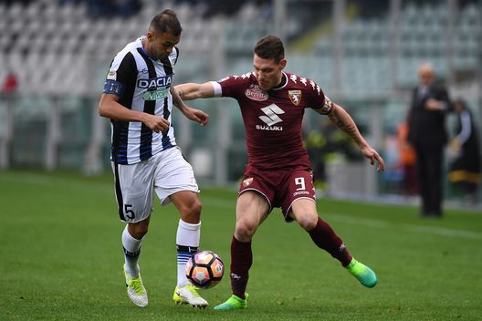 TURIN, ITALY - APRIL 02: Andrea Belotti (R) of FC Torino is challenged by Larangeira Danilo of Udinese Calcio during the Serie A match between FC Torino and Udinese Calcio at Stadio Olimpico di Torino on April 2, 2017 in Turin, Italy. (Photo by Valerio Pennicino/Getty Images)