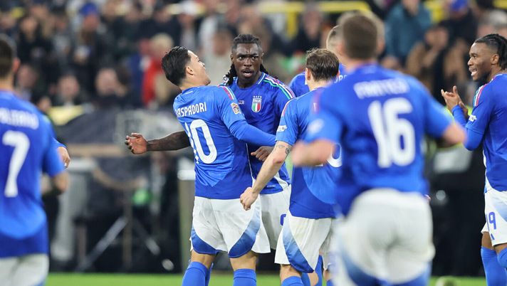 DORTMUND, GERMANY - MARCH 23: Moise Kean of Italy celebrates scoring his team's second goal with teammate Giacomo Raspadori during the UEFA Nations League Quarterfinal Leg Two match between Germany and Italy at Football Stadium Dortmund on March 23, 2025 in Dortmund, Germany. (Photo by Christof Koepsel/Getty Images for DFB) Moise Kean