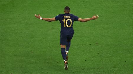 LUSAIL CITY, QATAR - DECEMBER 18: Kylian Mbappe of France celebrates after scoring his sides second goal during the FIFA World Cup Qatar 2022 Final match between Argentina and France at Lusail Stadium on December 18, 2022 in Lusail City, Qatar. (Photo by Alex Pantling/Getty Images)