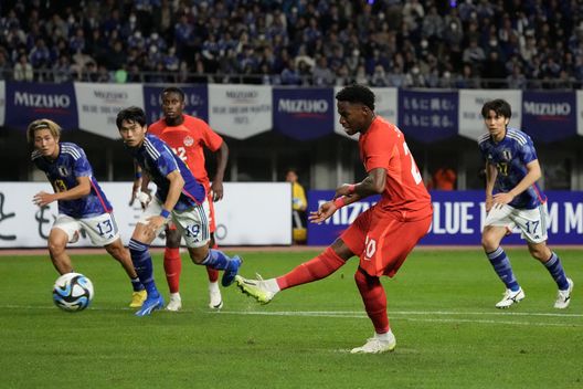 NIIGATA, JAPAN - OCTOBER 13: Jonathan David of Canada takes a penalty that is saved by Keisuke Osako of Japan during the international friendly match between Japan and Canada at Denka Big Swan Stadium on October 13, 2023 in Niigata, Japan. (Photo by Koji Watanabe/Getty Images)