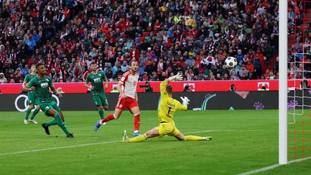 MUNICH, GERMANY - AUGUST 27: Harry Kane of Bayern Munich scores the team's third goal during the Bundesliga match between FC Bayern München and FC Augsburg at Allianz Arena on August 27, 2023 in Munich, Germany. (Photo by Joosep Martinson/Getty Images)