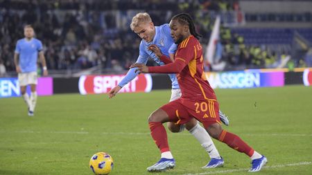 ROME, ITALY - NOVEMBER 12: AS Roma player Renato Sanches competes with SS Lazio player Gustav Isaksen during the Serie A TIM match between SS Lazio and AS Roma at Stadio Olimpico on November 12, 2023 in Rome, Italy. (Photo by Luciano Rossi/AS Roma via Getty Images)