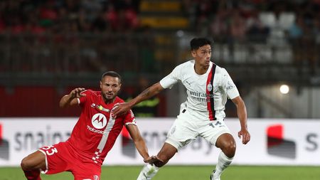 MONZA, ITALY - AUGUST 08: Tijjani Reijnders of AC Milan competes for the ball with Danilo D’Ambrosio of AC Monza during the Trofeo Silvio Berlusconi between AC Monza and AC Milan at U-Power Stadium on August 08, 2023 in Monza, Italy. (Photo by Marco Luzzani/Getty Images)
