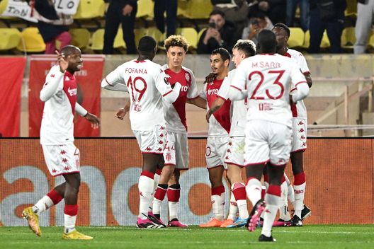 MONACO, MONACO - FEBRUARY 23: Wissam Ben Yedder of AS Monaco celebrates with teammates after scoring the team's first goal from a penalty kick during the UEFA Europa League knockout round play-off leg two match between AS Monaco and Bayer 04 Leverkusen at Stade Louis II on February 23, 2023 in Monaco, Monaco. (Photo by Chris Ricco/Getty Images) Monaco