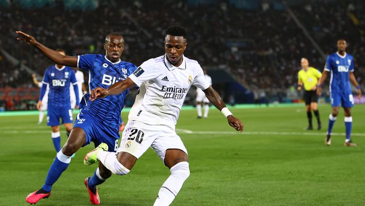 RABAT, MOROCCO - FEBRUARY 11: Vinicius Junior of Real Madrid shields the ball from Saud Abdulhamid of Al Hilal during the FIFA Club World Cup Morocco 2022 Final match between Real Madrid and Al Hilal at Prince Moulay Abdellah on February 11, 2023 in Rabat, Morocco. (Photo by Michael Steele/Getty Images) Real Madrid Al-Hilal