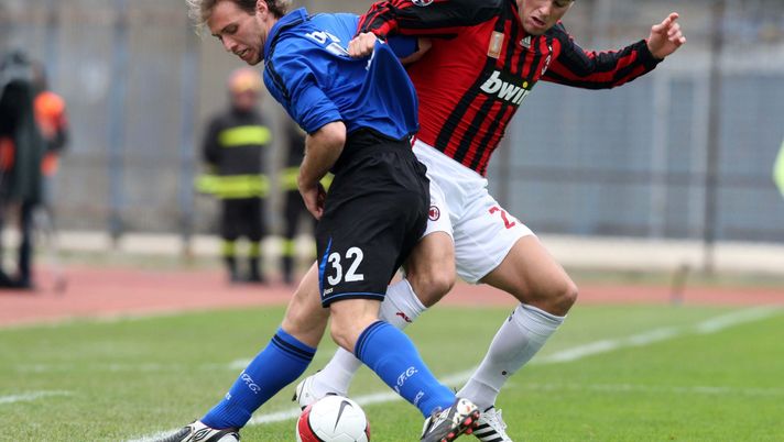 EMPOLI, ITALY - MARCH 09: Yoann Gourcuff of AC Milan tackles Alessandro Budel of Empoli during the Serie A match between Empoli and AC Milan at the Stadio Carlo Castellani on March 9, 2008 in Empoli, Italy. (Photo by New Press/Getty Images) EMPOLI, ITALY - MARCH 09: Yoann Gourcuff of AC Milan tackles Alessandro Budel of Empoli during the Serie A match between Empoli and AC Milan at the Stadio Carlo Castellani on March 9, 2008 in Empoli, Italy. (Photo by New Press/Getty Images)