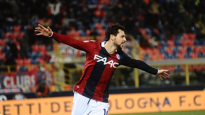 BOLOGNA, ITALY - FEBRUARY 24: Mattia Destro of Bologna FC celebrates after passing the assist of the second goal of his team during the serie A match between Bologna FC v Genoa CFC at Stadio Renato Dall'Ara on February 24, 2018 in Bologna, Italy. (Photo by Mario Carlini / Iguana Press/Getty Images) Destro