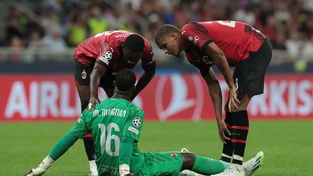 MILAN, ITALY - SEPTEMBER 19: Mike Maignan of AC Milan speaks with Fikayo Tomori and Malick Thiaw of AC Milan after going down with an injury during the UEFA Champions League match between AC Milan and Newcastle United FC at Stadio Giuseppe Meazza on September 19, 2023 in Milan, Italy. (Photo by Emilio Andreoli/Getty Images)