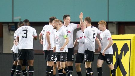 VIENNA, AUSTRIA - MARCH 26: Xaver Schlager of Austria celebrates with teammates after scoring his team's first goal up during the international friendly match between Austria and Turkiye at Ernst Happel Stadion on March 26, 2024 in Vienna, Austria. (Photo by Christian Hofer/Getty Images)