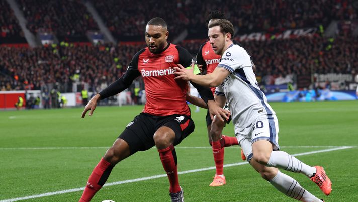 LEVERKUSEN, GERMANY - DECEMBER 10: Jonathan Tah of Bayer 04 Leverkusen and Carlos Augusto of FC Internazionale compete for the ball during the UEFA Champions League 2024/25 League Phase MD6 match between Bayer 04 Leverkusen and FC Internazionale Milano at BayArena on December 10, 2024 in Leverkusen, Germany. (Photo by Lars Baron/Getty Images) Bayer Leverkusen Inter Jonathan Tah