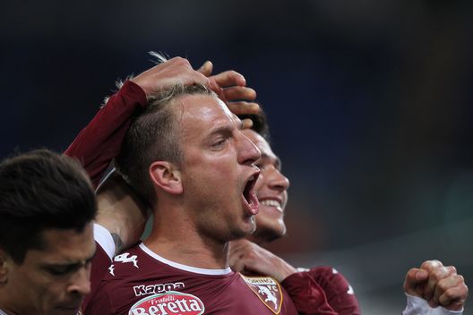 ROME, ITALY - MARCH 13: Maxi Lopez with his teammates of FC Torino celebrates after scoring the team's first goal during the Serie A match between SS Lazio and FC Torino at Stadio Olimpico on March 13, 2017 in Rome, Italy. (Photo by Paolo Bruno/Getty Images)